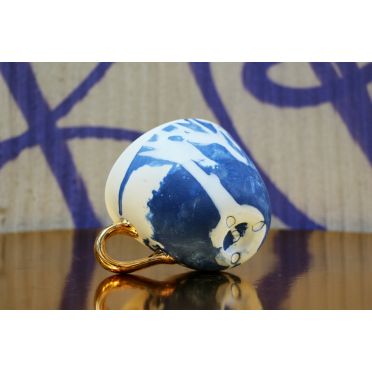 Porcelanowa filiżanka ze złotem