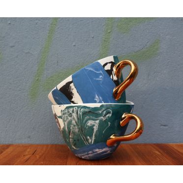 Porcelanowa filiżanka ze złotem